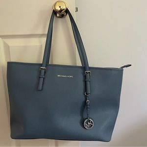 Blue Michael Kors shoulder bag with computer compartment